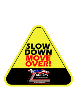 slow down or move over yellow sign